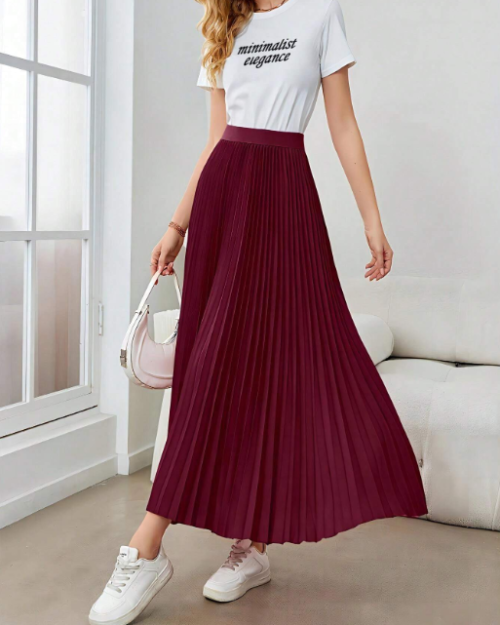 Saia plissada feminina minimalista, elegante e versátil.